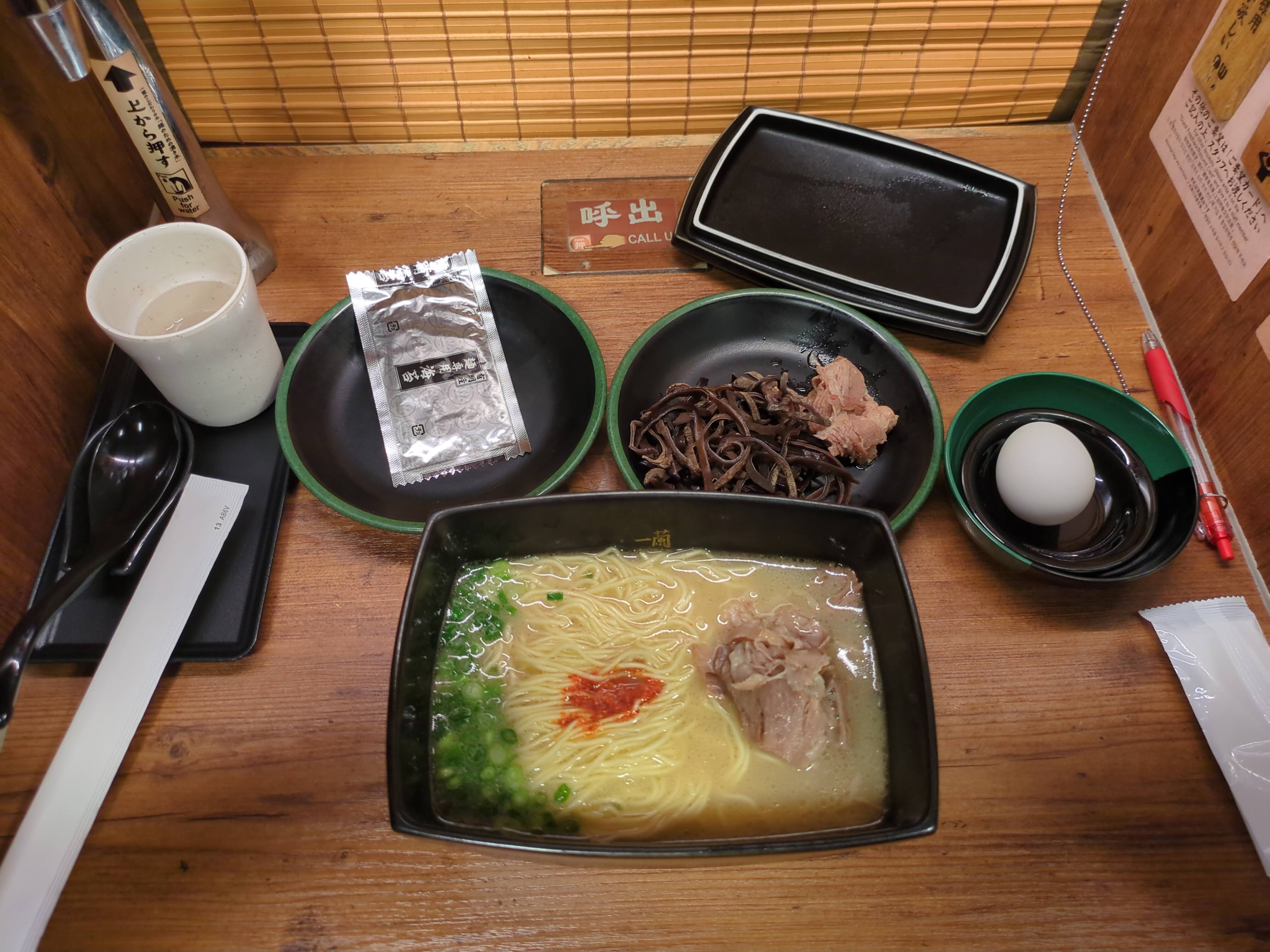 Ramen served inside an individual dining cubby